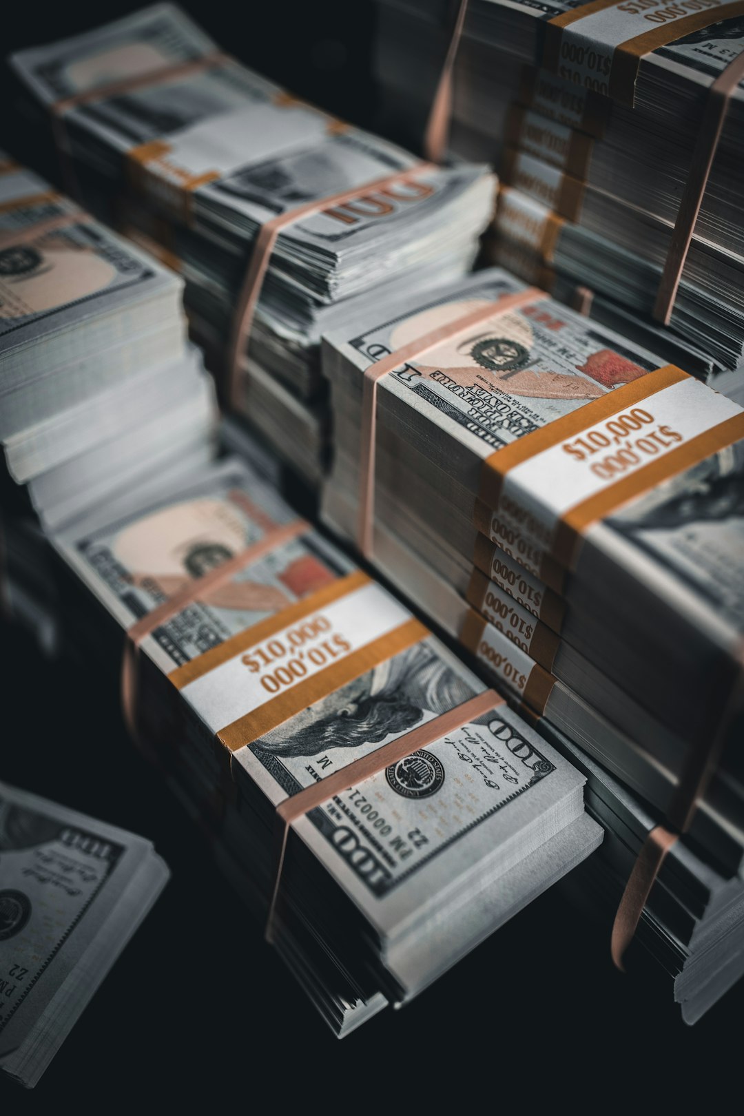 a-pile-of-twenty-dollar-bills-sitting-on-top-of-each-other-bvvwcoazqb0